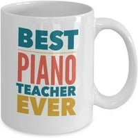 Najbolji učitelj klavira ikad šolja za kafu. Svijetli, savremeni stil. Dizajniran za muškarce ili žene. Svakako donesite osmijeh na licu bilo kojeg klavirskog učitelja. Bijela keramička oz šalica. Izdržljiv otisak na obje strane