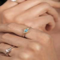 Gem Stone King Sterling srebrni i 10k žuti zlatni okrugli plavi cirkon i bijeli laboratorijski uzgojni dijamantni zaručnički prsten za žene